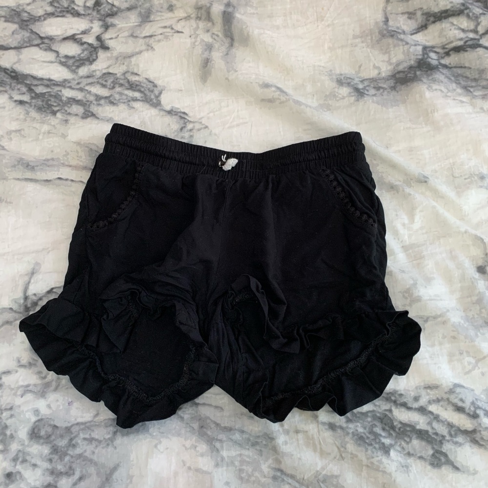 black ruffle shorts